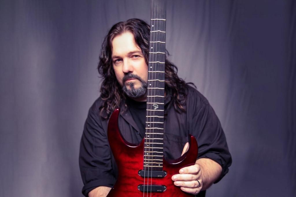 TOMMY DENANDER’s RADIOACTIVE Release Music Video For “Written In The Scars” Featuring CHRISTIAN INGEBRIGTSEN
